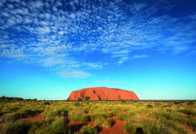 Late afternoon view of Ayers Rock in Australia's Outback.