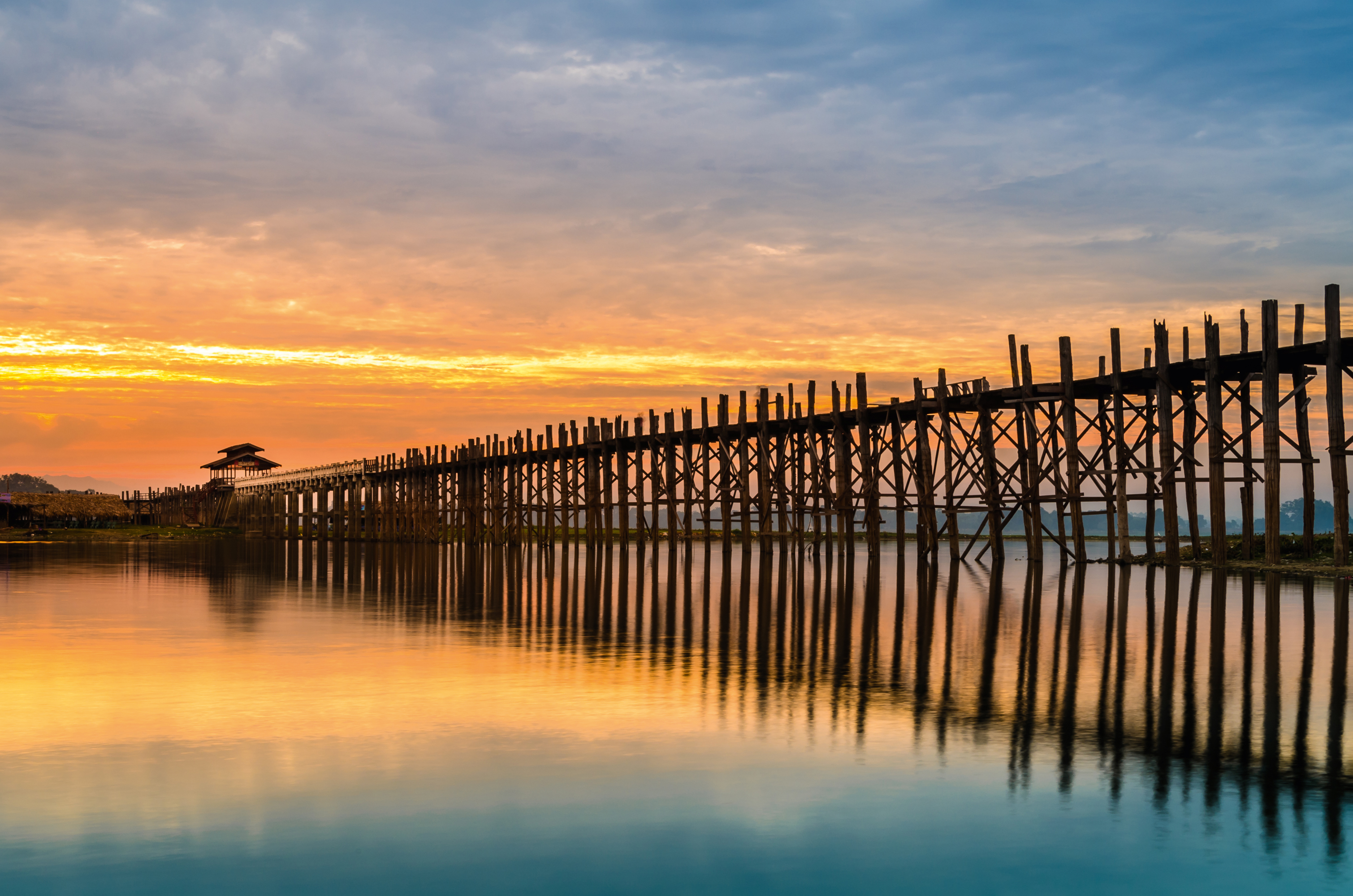 Ubein Bridge at sunrise, Mandalay, Myanmar Ubein Bridge at sunrise, Mandalay, Myanmar